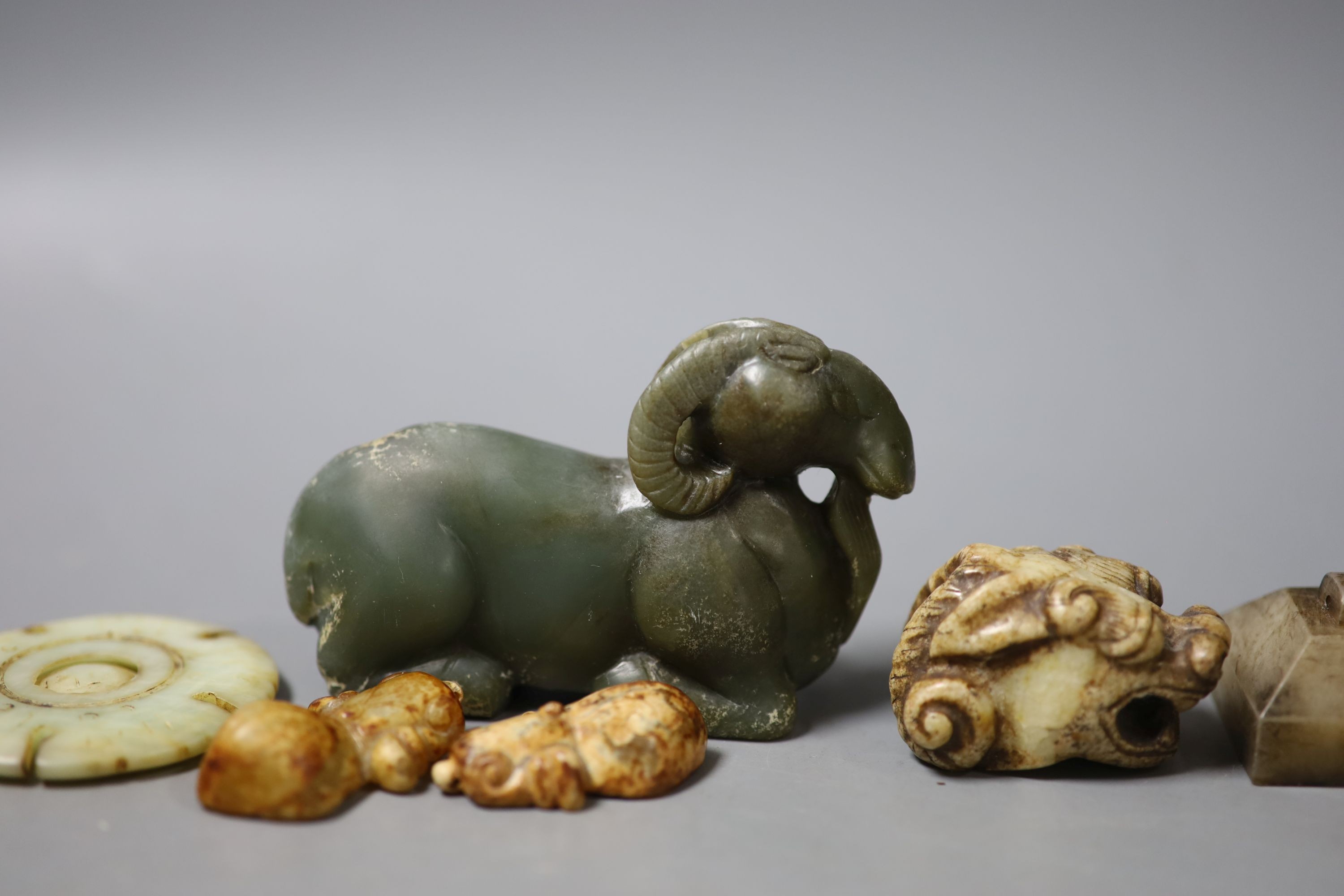 A group of Chinese archaistic jade and hardstone carvings, largest, 9cm (8)